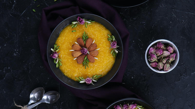 Sholeh zard, Persian saffron rice pudding decorated with cinnamon and pistachios, made with Raihan Afghan Super Negin saffron
