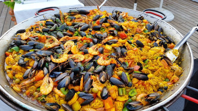 Seafood paella with saffron rice, shrimp, mussels and clams made with Raihan Afghan Super Negin saffron