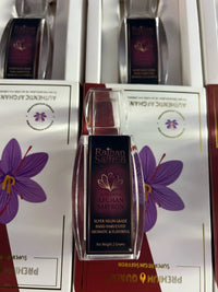 Raihan Saffron bottle on the packing table with retail boxes — hand-packed in Lynn, Massachusetts