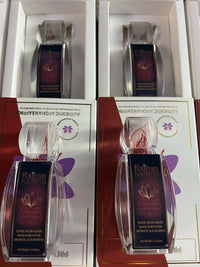 Raihan Saffron bottles nested in white presentation gift boxes — packed by hand in Lynn, Massachusetts